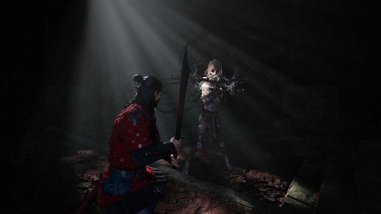 A dark cavern, Coen with a long blade facing a shadowy creature.